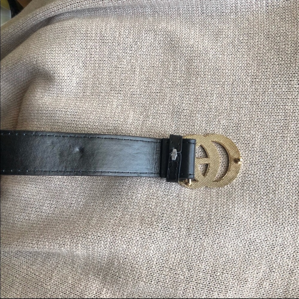 BLAC AND GOLD GUCCI BELT